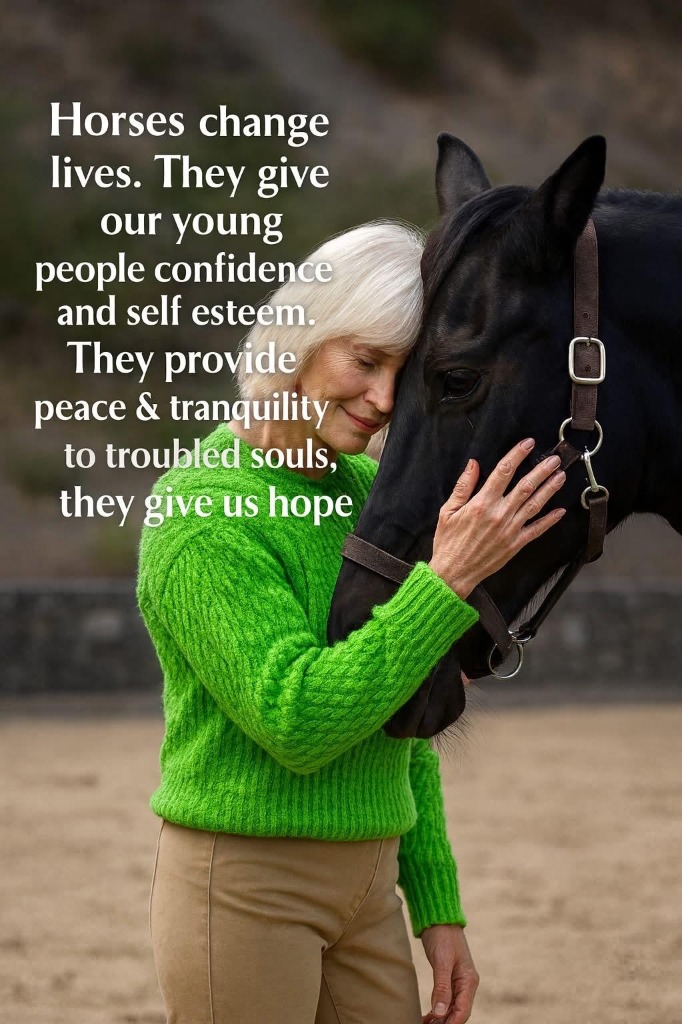 Woman embracing a horse at Red Bird Cottage and Farm